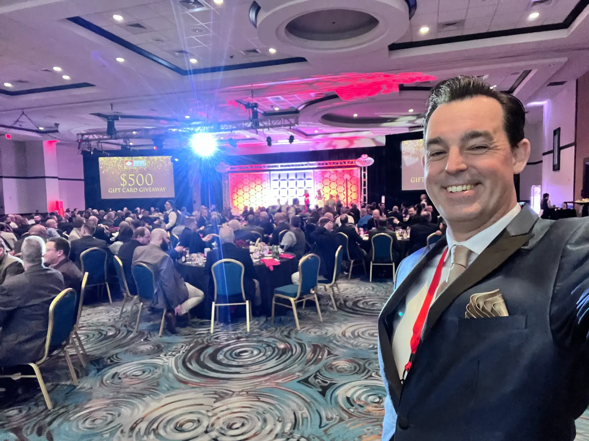 Mentalist Adam Stone at the Mccarthy Awards Ceremony with a Full Ballroom of Corporate Guests Seated at Dinner Tables