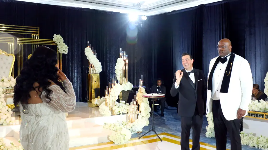Mentalist Adam Stone Performing Interactive Mind Reading with a Bride and Groom at Their Wedding Reception