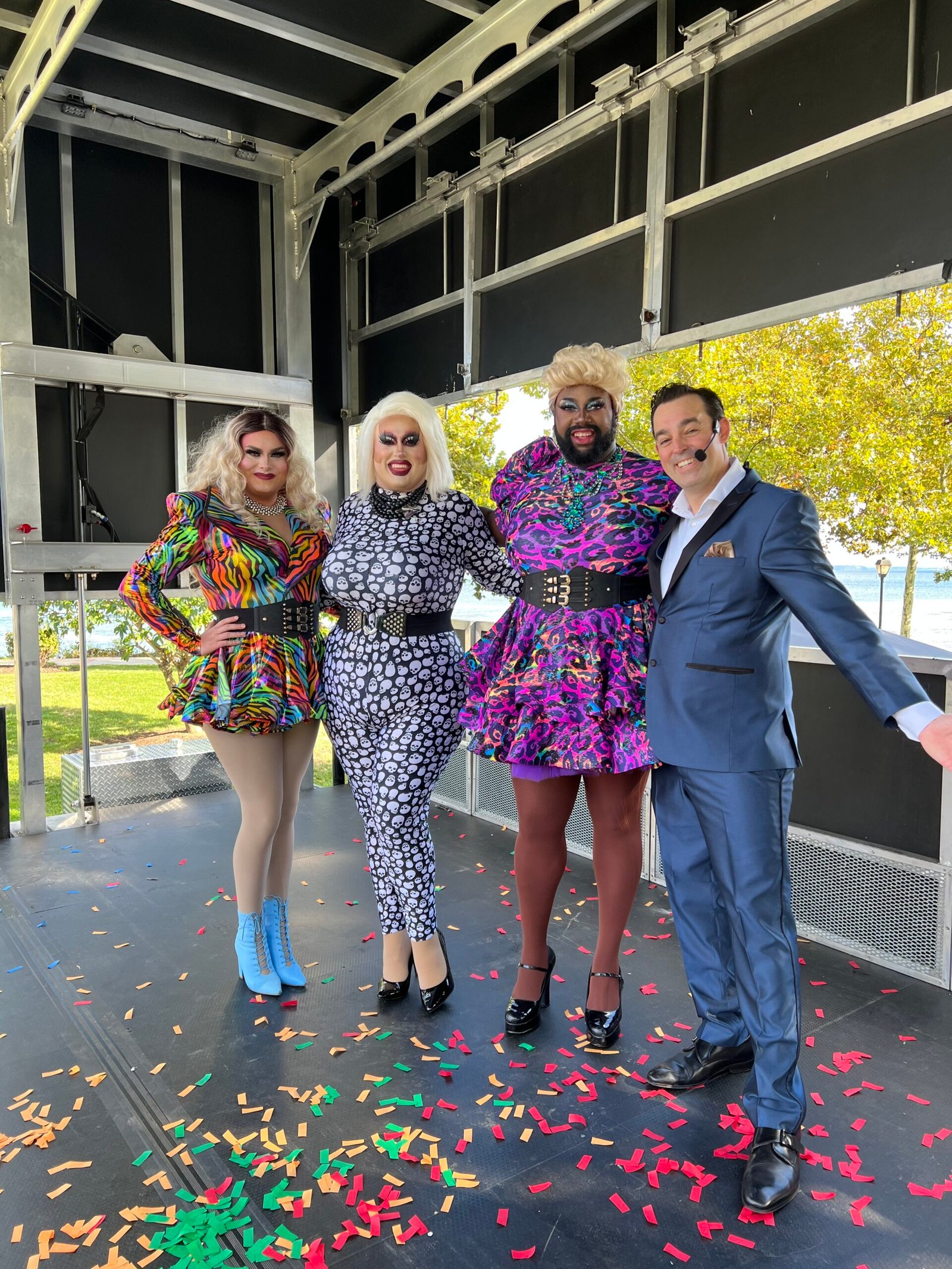 Adam Stone Pride Event Stage Performance Adam Stone Magic Adam Stone Magic Mentalist Adam Stone on Stage with Four Drag Queens at a Pride Event