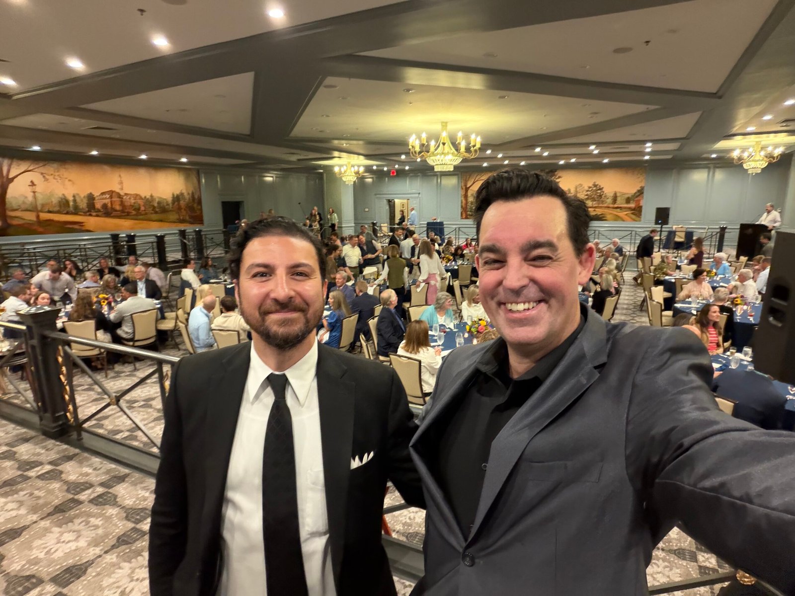 Corporate Mentalists Adam Stone and Kourosh Taie at the Omni Homestead Resort Adam Stone Magic Corporate Mentalists Adam Stone and Kourosh Taie Standing at a Railing at the Omni Homestead Resort in Hot Springs Virginia with the Davenport Group Gathered Below